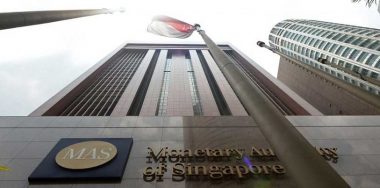 singapore-central-bank-issues-new-warning-btc-investments-879x402 (1)