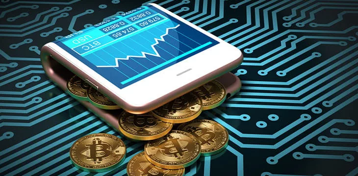 Concept Of Digital Wallet And Bitcoins On Printed Circuit Board