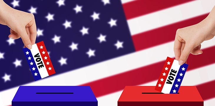 2 hands dropping votes on different ballot boxes with the American flag at the background. Concept of election and voting