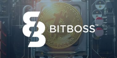 Bitboss logo against a background photo of Bitcoin on a blockchain