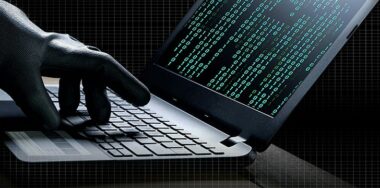 collage of hacker hand in black glove using laptop to hacking system with binary code in screen on the desk with white grid striped in dark night background