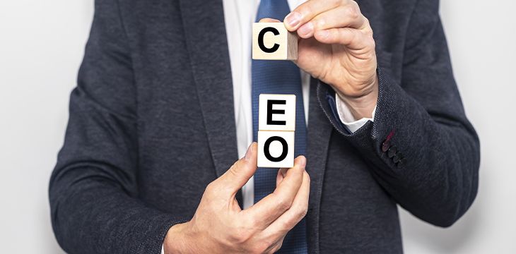 businessman with CEO blocks