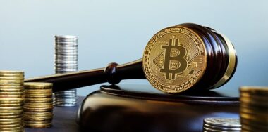 Gavel with Bitcoin placed on its side