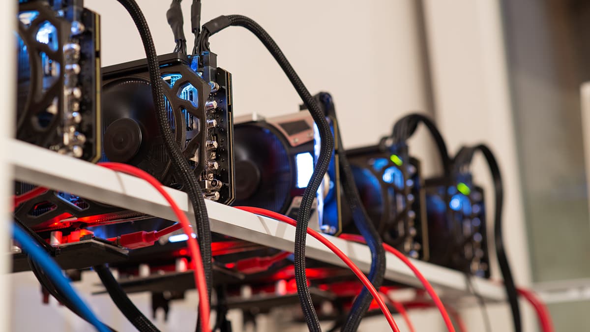 Five crypto currency graphic cards mining rig in a conceptual image of modern technology and earning