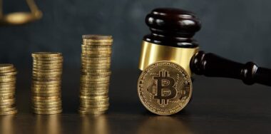 Law Gavel and stack of golden bitcoin symbol