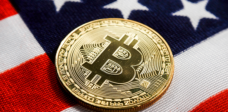 Crypto currency bitcoin btc golden bit coin against flag of USA