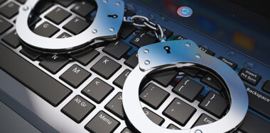 Handcuffs on Laptop