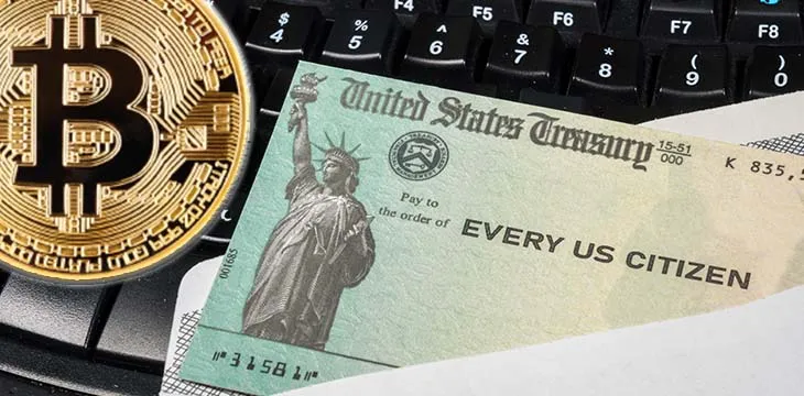 US treasury note with bitcoin logo beside it