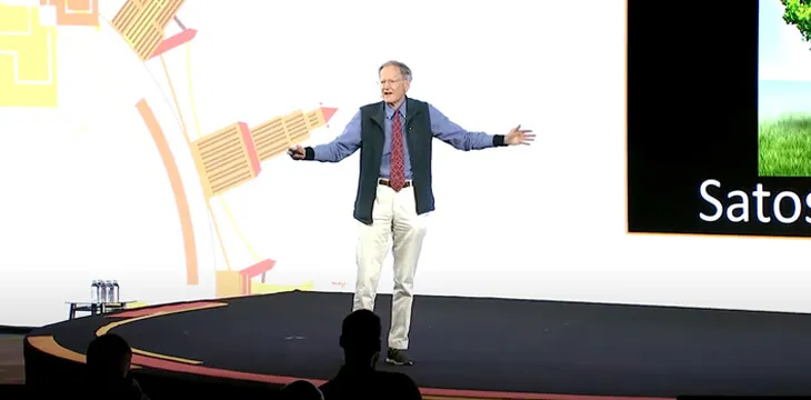 george gilder talking on stage