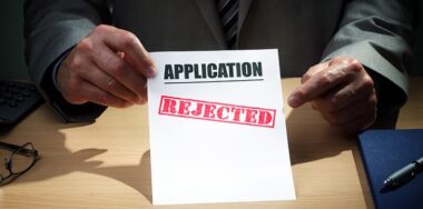 Businessman showing application has been rejected