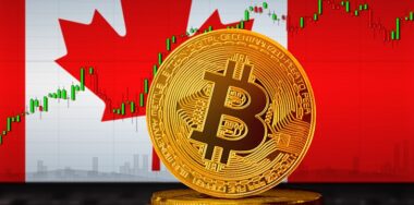 Bitcoin in front of the flag of Canada