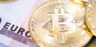Bitcoins over euro bill