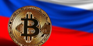 Bitcoin with Russia's flag