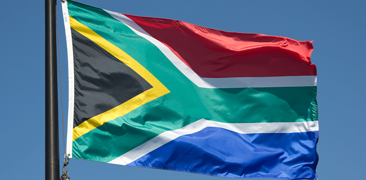 South african flag in a pole
