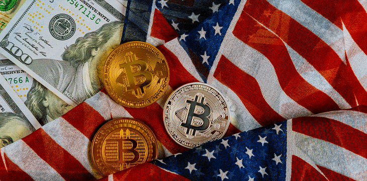 US Flag with dollar bank notes and bitcoin coins
