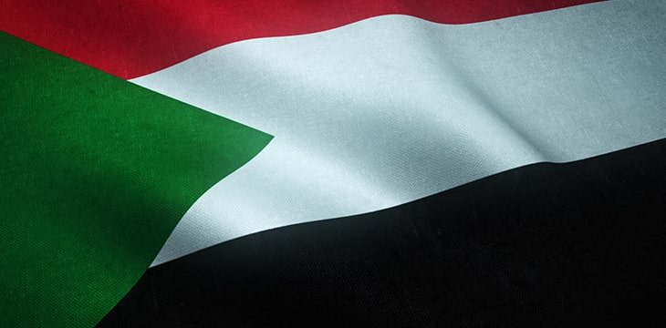 A closeup shot of the waving flag of Sudan