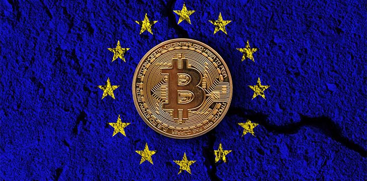 Bitcoin crypto currency coin with cracked EU flag