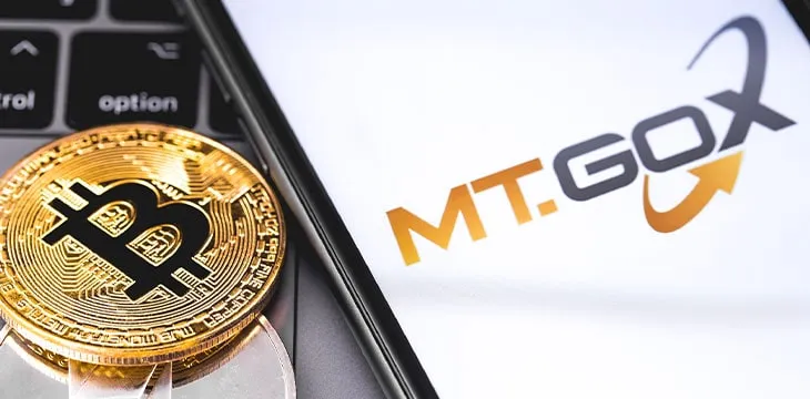 MT.GOX logo of exchange on the screen smartphone