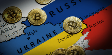 Bitcoin standing on the map of Russia
