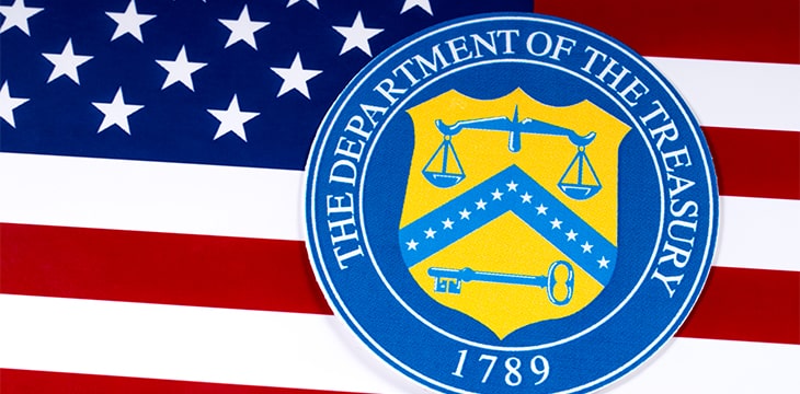The symbol of the United States Department of the Treasury portrayed with the US flag