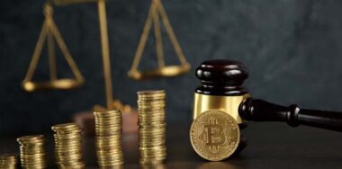 Auction gavel and bitcoin cryptocurrency money