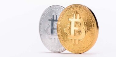 gold and silver coin of bitcoin