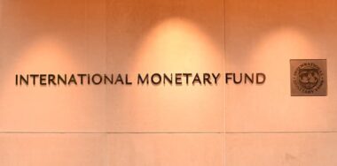 Emblem of International Monetary Fund on the Headquarters 2 Building (HQ2) in DC.