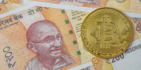 The India banknote and bit coin for business content.