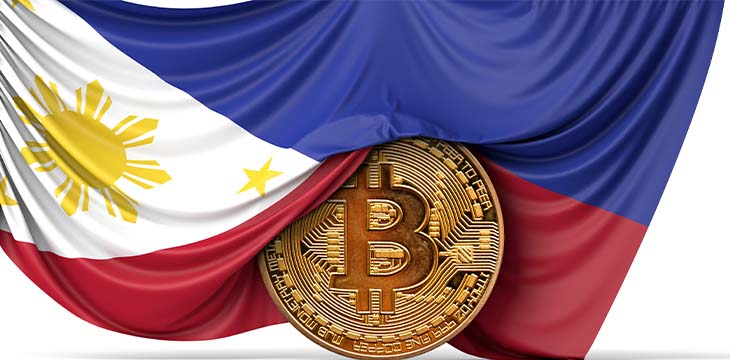 Philippines flag draped over a bitcoin cryptocurrency coin. 3D Rendering