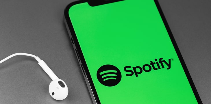 Spotify logo mobile app on screen smartphone