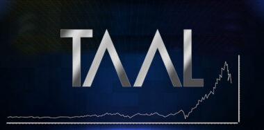 TAAL logo on a financial concept background