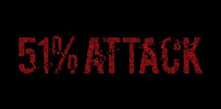 51% attack on blockchain futuristic binary red text glowing in the dark.