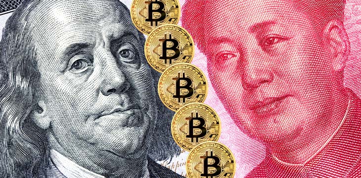 Bitcoin and portraits of Benjamin Franklin against Mao Zedong. Business concept of worldwide digital money and trade war