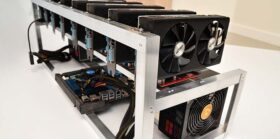 Mining rigs for cryptocurrency, bitcoin mining equipment isolated over grey background, computer equipmen