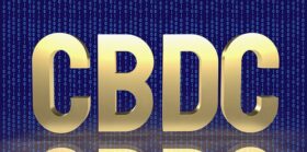 Cbdc gold text on digital background for business