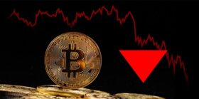 Golden coins with bitcoin logo drop
