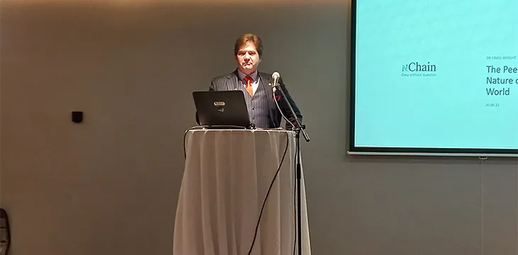 Dr. Craig Wright on stage at Global IoT summit in Dublin