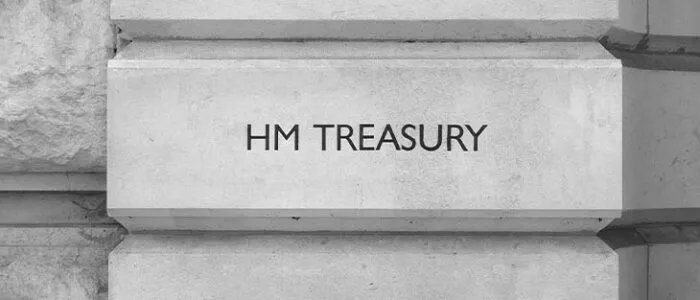 HMRC (Her Majesty Treasury) sign in London, UK in black and white