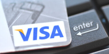 Closeup of VISA credit card on laptop keyboard