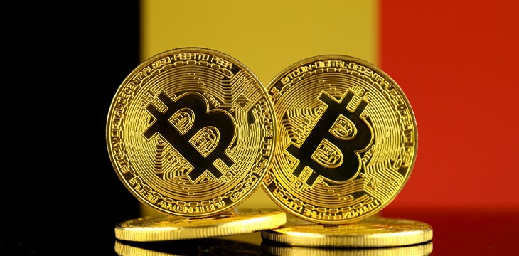 Physical version of Bitcoin and Belgium Flag