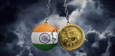 India flag smashing into a gold bitcoin crypto coin