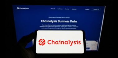 a smartphone screen with the logo of Chainalysis