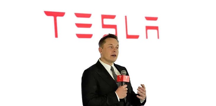 Tesla CEO Elon Musk speaks during a press conference