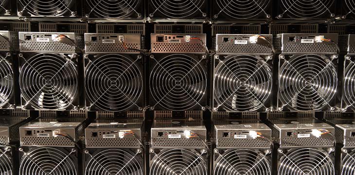 Bitcoin ASIC miners in warehouse