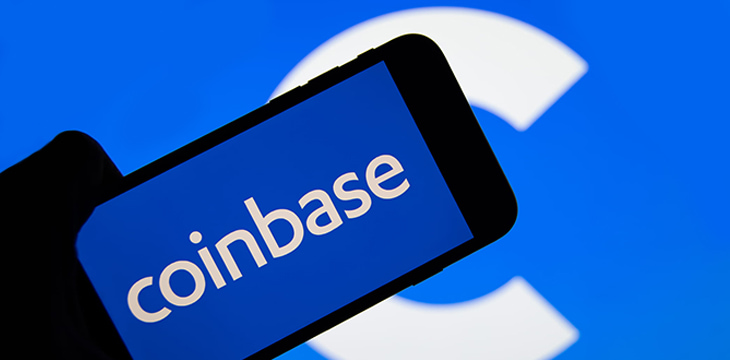 coinbase logo on mobile and coinbase background