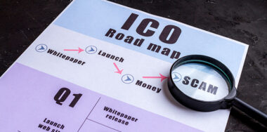 ICO Road Map with magnifying glass focused on word scam