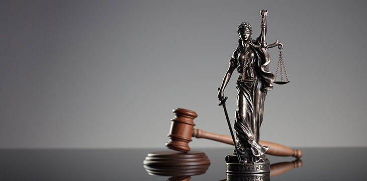 Statue of Lady Justice with gavel