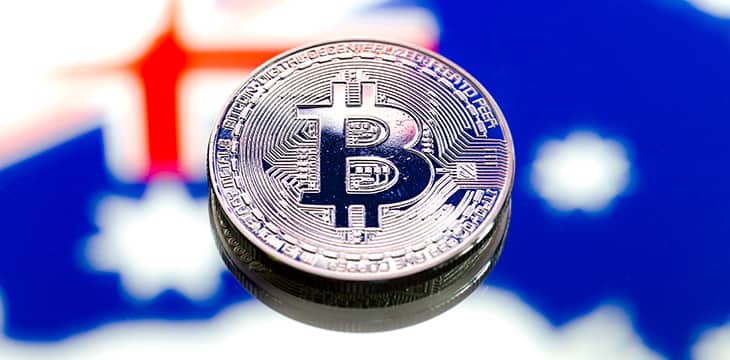 Coins Bitcoin, against the background of Australia.