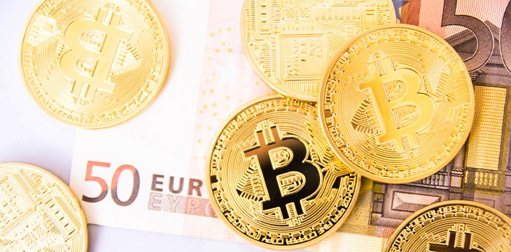 Bitcoins over euro bill