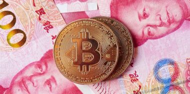 Chinese Yuan money and cryptocurrency Bitcoin
